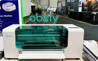 Obziy DP1 DTF printer at IFA 2025 exhibition, showcasing the new all-in-one printing machine