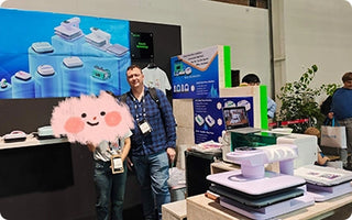 Obziy at IFA trade show, demonstrating advanced DTF printing technology to industry visitors